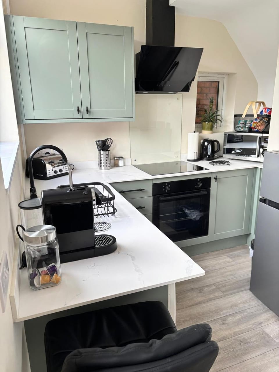 Kitchen or kitchenette, stove, toaster