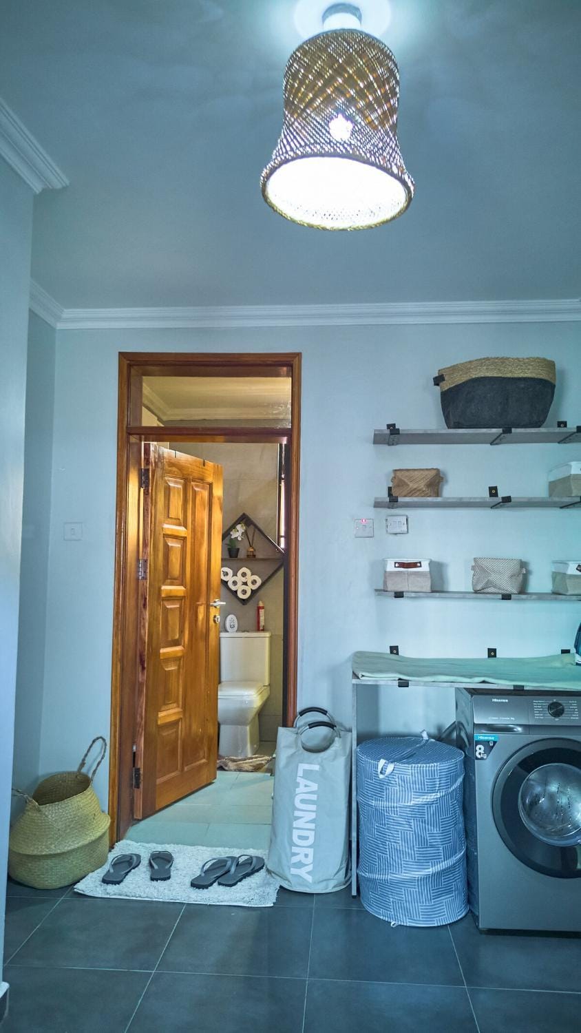 Kitchen or kitchenette, laundry, washing machine
