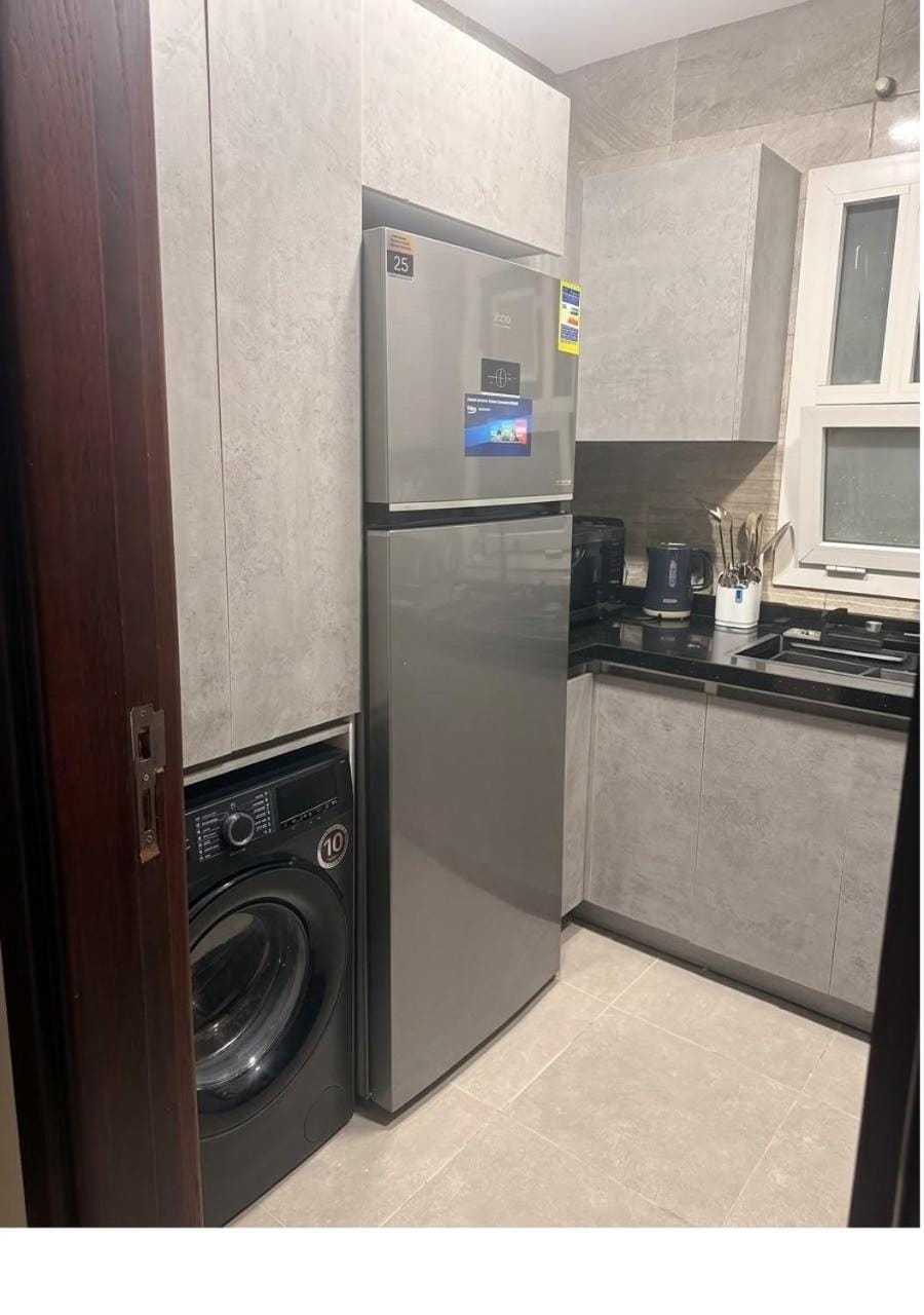 Kitchen or kitchenette, washing machine, dryer