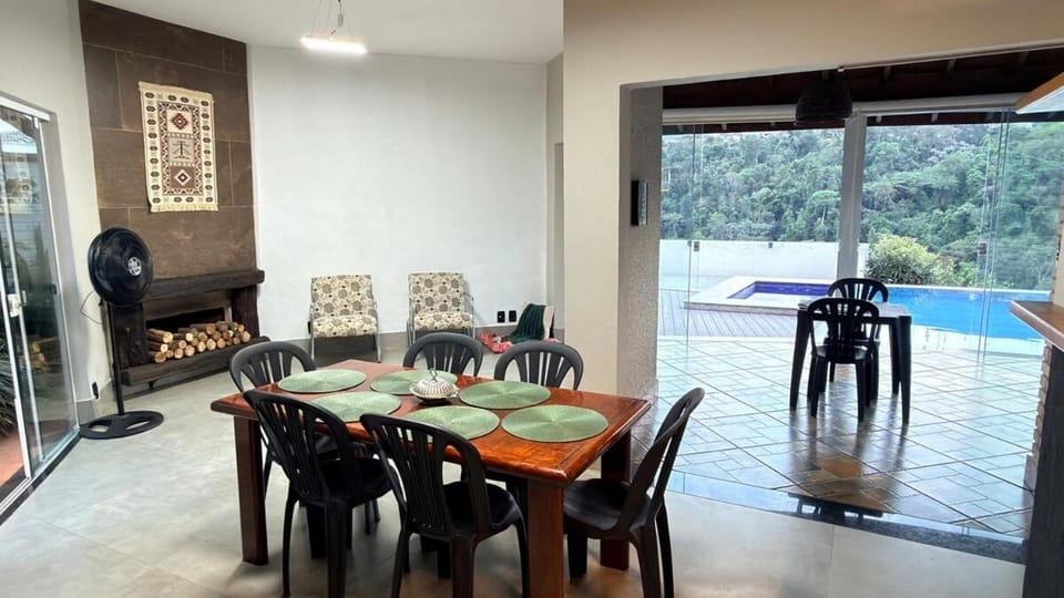Patio, Living room, Seating area, Dining area, Pool view, Swimming pool