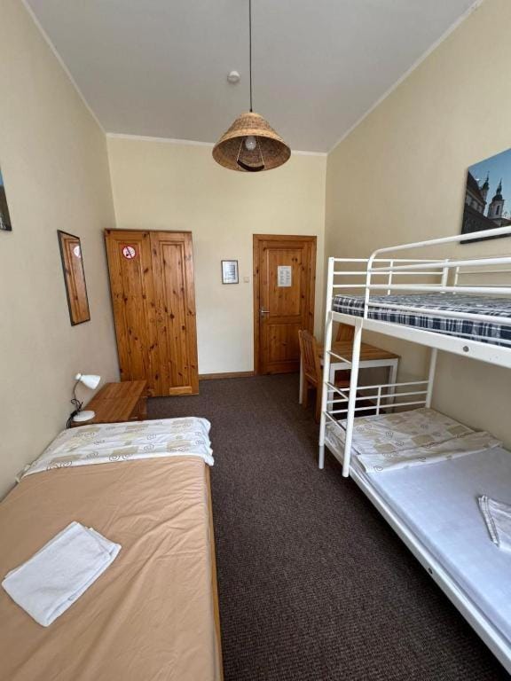 Bed, Photo of the whole room, bunk bed, towels, wardrobe
