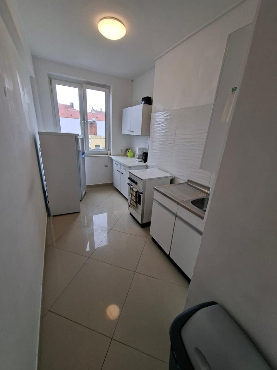 Kitchen or kitchenette, oven, stove