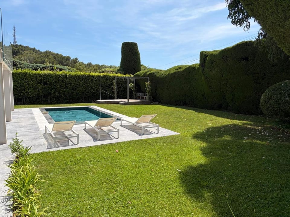 Property building, Living room, Swimming pool