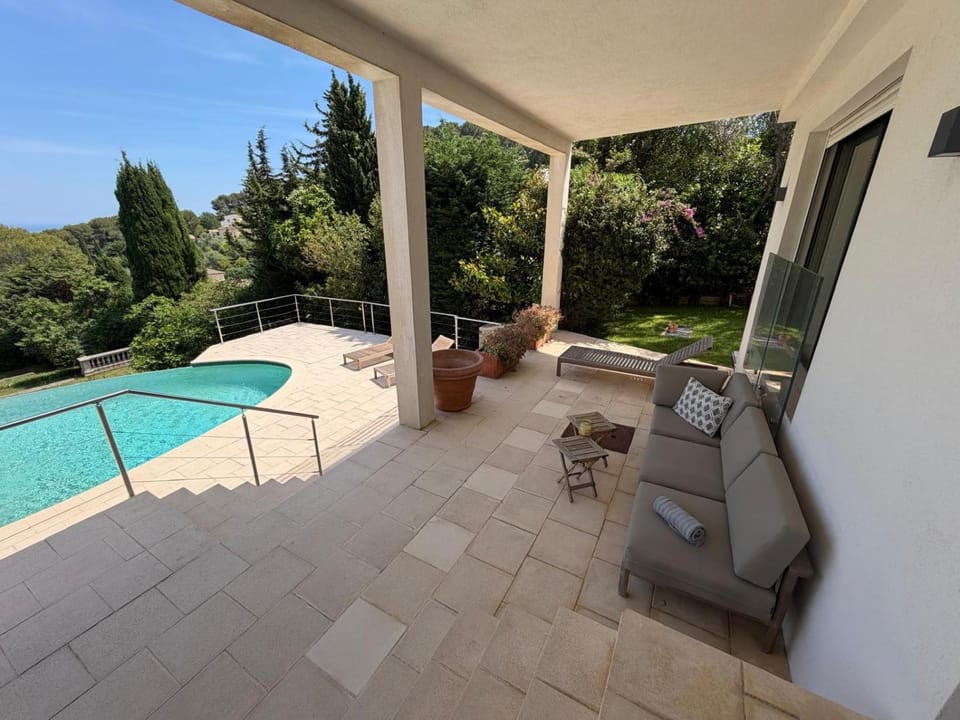 Property building, Living room, Swimming pool