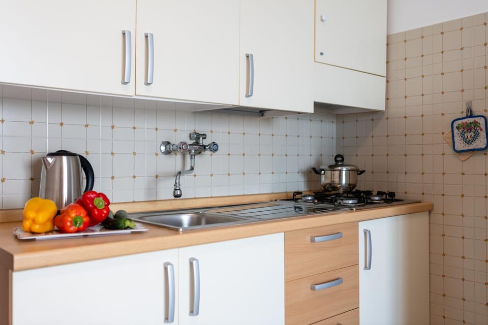 Kitchen or kitchenette, stove