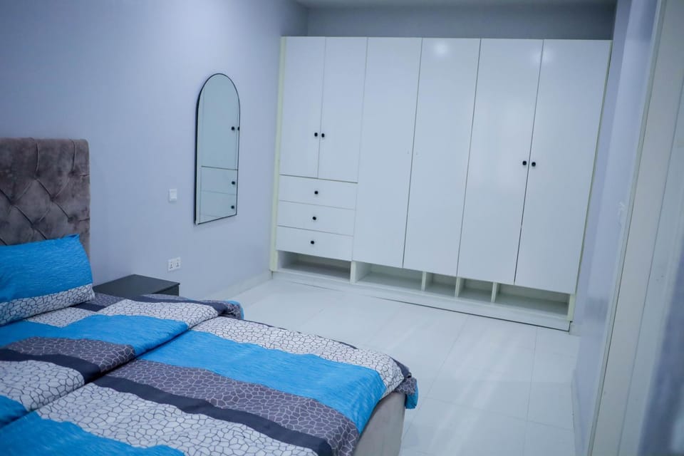 Bed, wardrobe