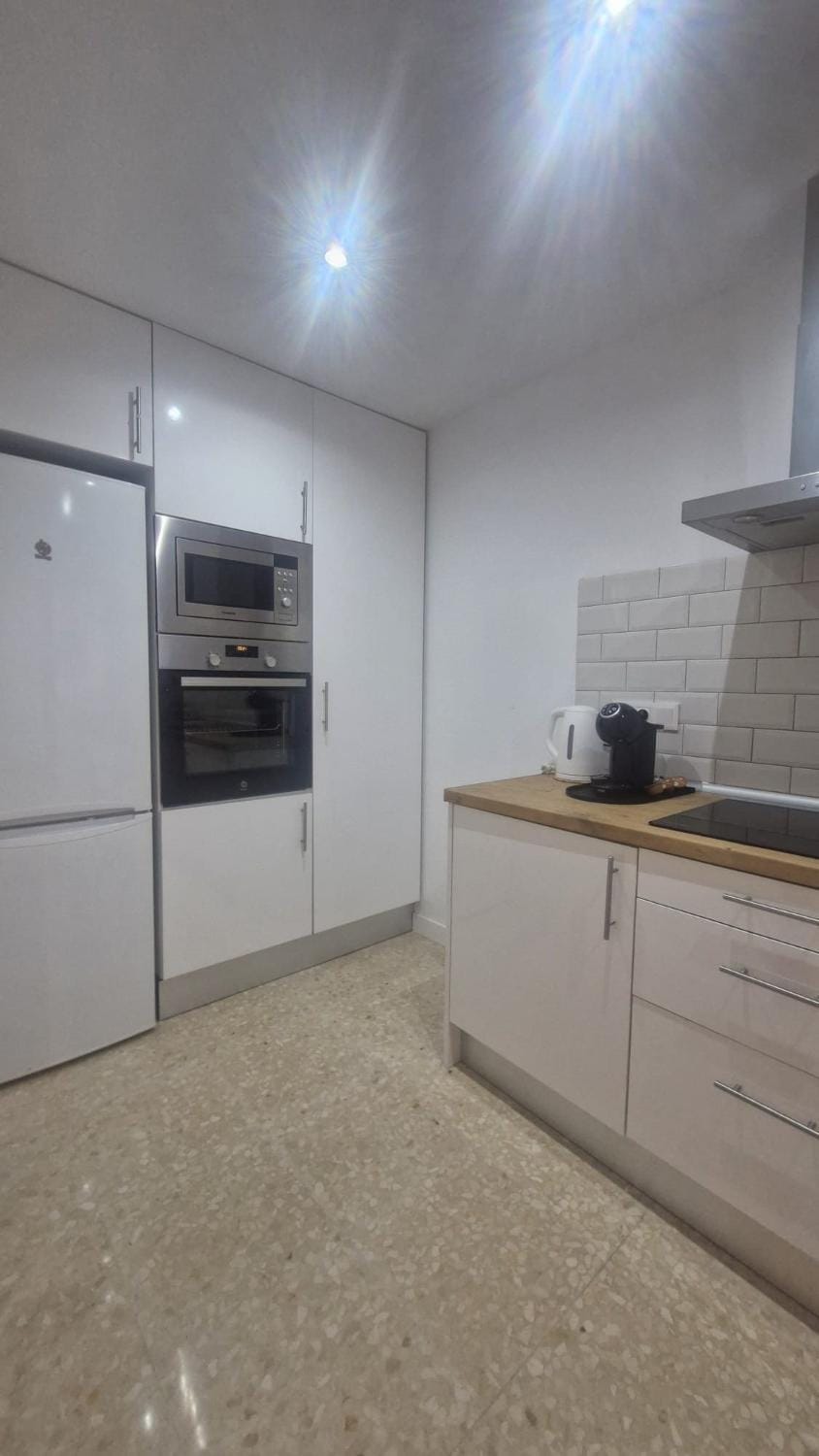 Kitchen or kitchenette, oven, stove