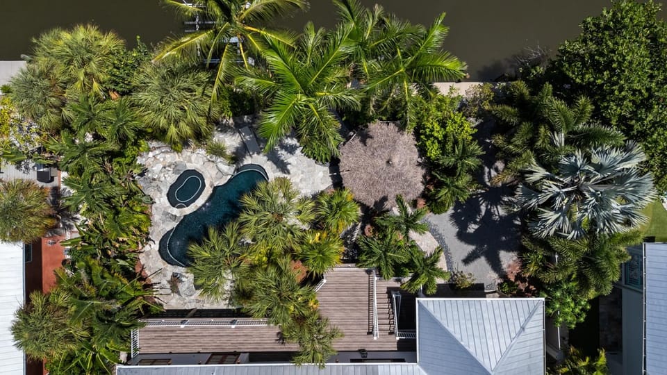 Coastal Beauty - Canal Front, Dock, Pool, Spa, Game Room by Anna Maria Life Vacation Rentals House in Holmes Beach