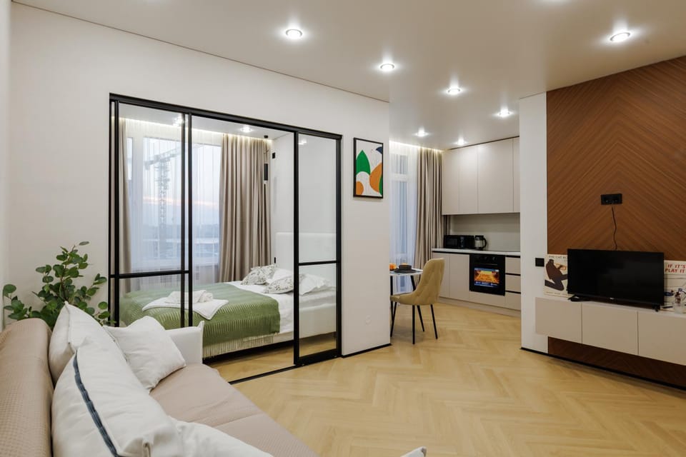 TV and multimedia, Kitchen or kitchenette, Living room, Seating area, oven, stove