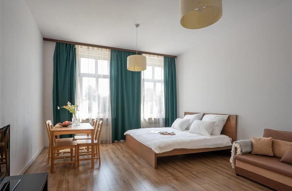 Bed, Living room, Seating area, Dining area