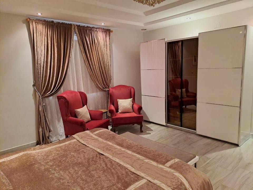 Bed, Seating area, Bedroom, wardrobe