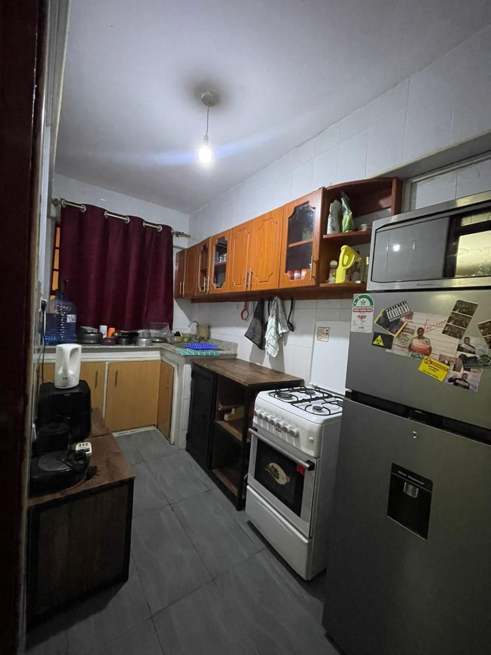 Kitchen or kitchenette, dishwasher, oven