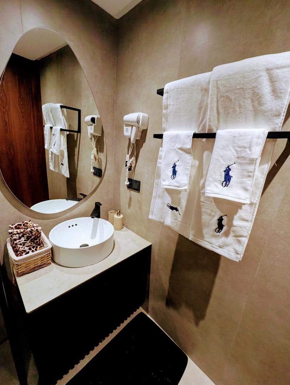 Bathroom, hair dryier, towels
