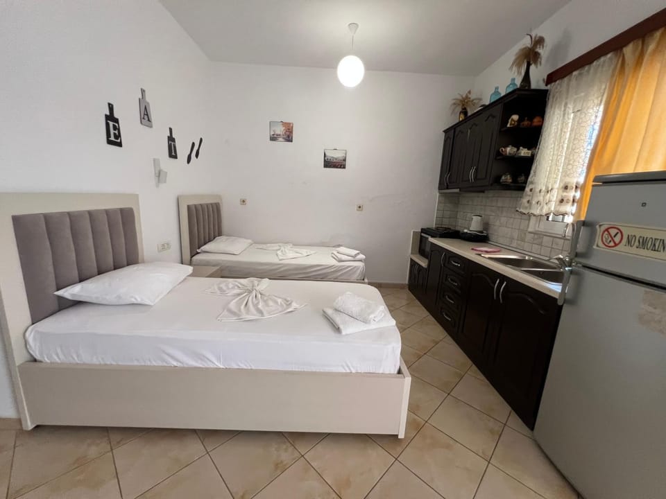 Bed, Kitchen or kitchenette, Bedroom, stove, towels