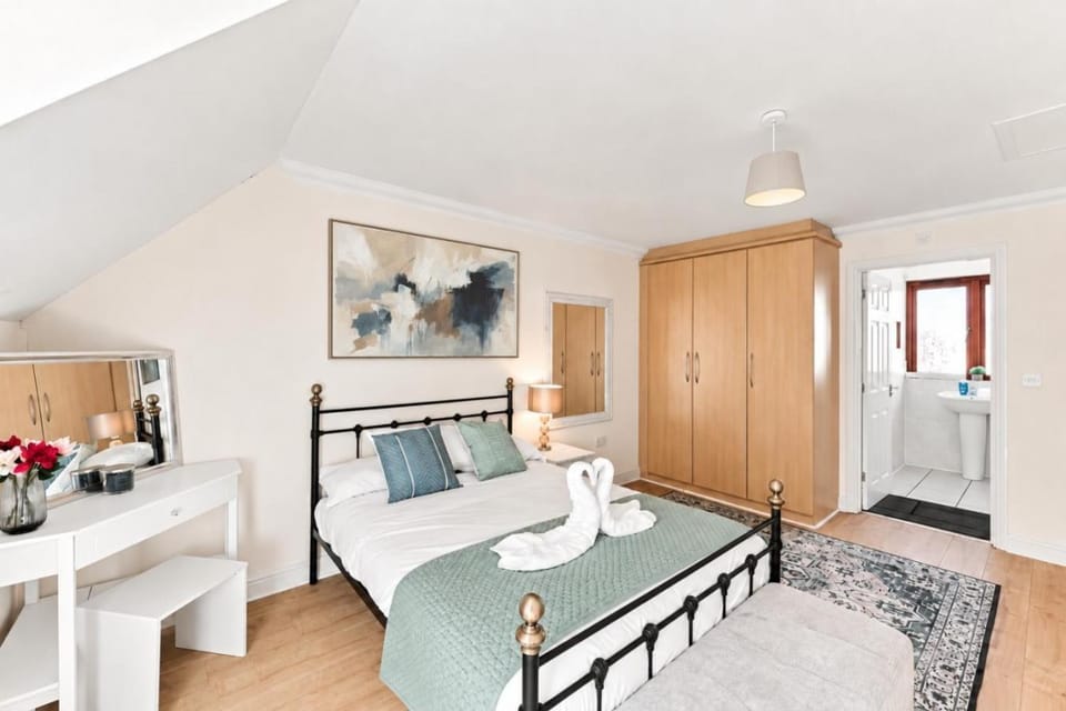 Bed, towels, wardrobe