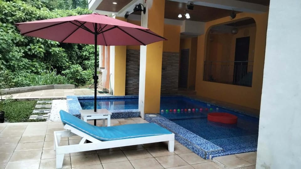 Property building, Patio, Day, View (from property/room), Balcony/Terrace, Seating area, Pool view, Swimming pool, sunbed
