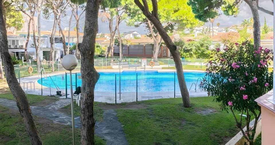 Property building, Living room, Swimming pool