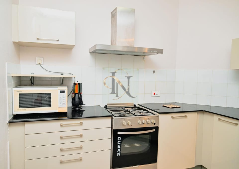 Kitchen or kitchenette, oven, stove