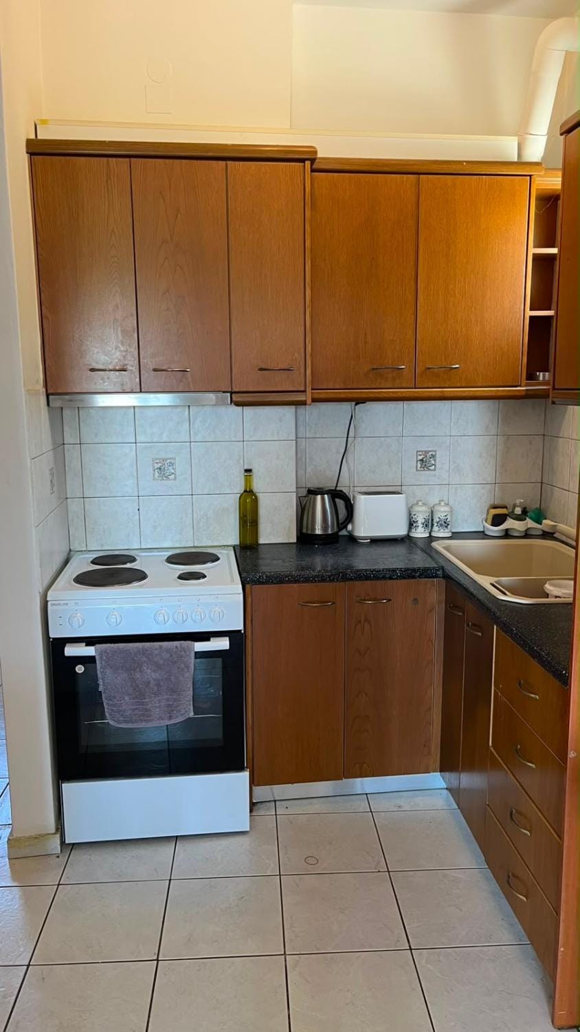Kitchen or kitchenette, stove