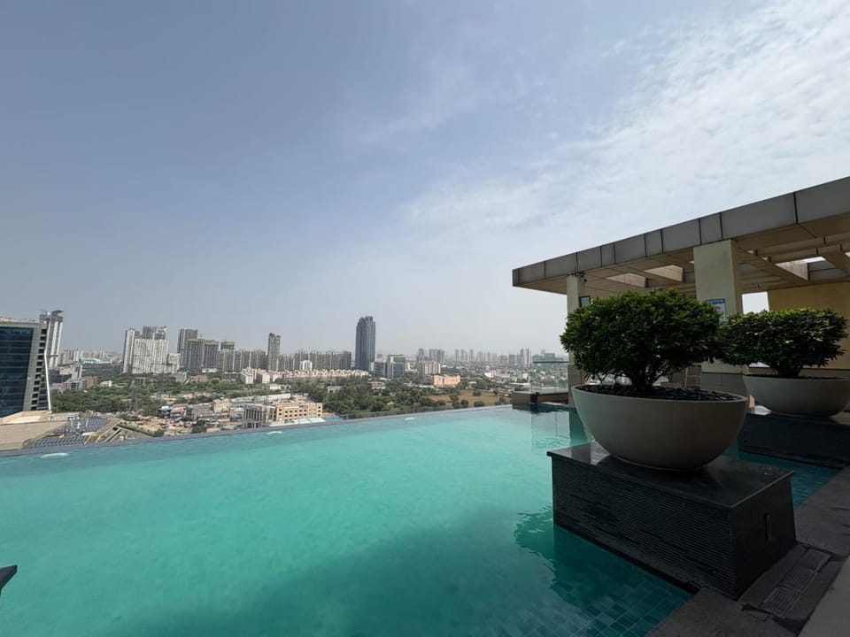 402, Designer Luxury 2BHK at MyDen, 3 Private Balconies, Beautiful City Views, Bright, Airy & Sunlit, 2 Ensuite Bedrooms, Premium Furnishings, Infinity Terrace Pool Urbana Market, Cafés & Dining Just Downstairs Apartment in Gurugram