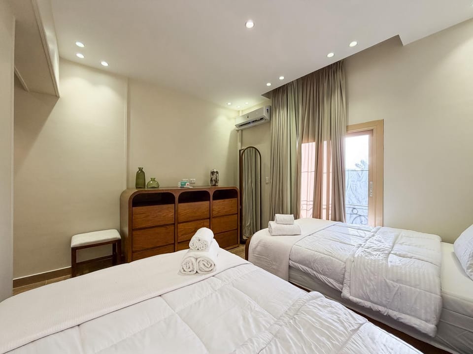 Bed, Photo of the whole room, Bedroom, towels, air conditioner
