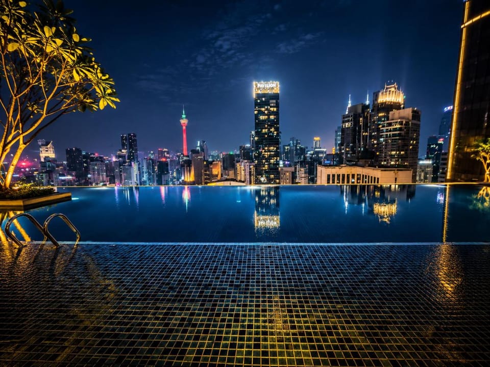 Property building, Nearby landmark, Night, City view, Pool view, Swimming pool