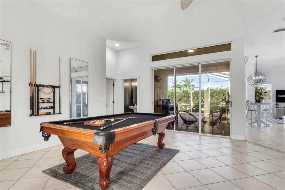 Waterfront Oasis Pool Private Dock Firepit House in Marco Island