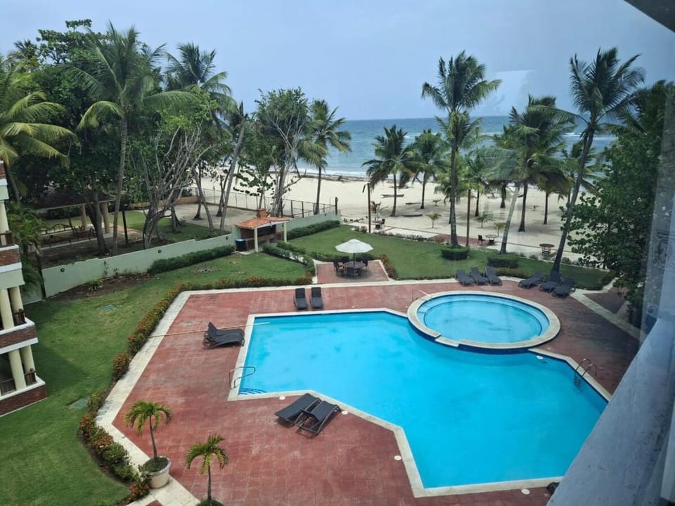 Get Away to Playa Juan Dolio, DR - Áreas Sociales Con Piscina, Gazebo, BBQ, Zona Privada De Playa, Vistas Expectaculares, Atardeceres De Ensueño, Wifi, Parqueo - Apartamentos de 2 y 3 Habitaciones Apartment in Juan Dolio