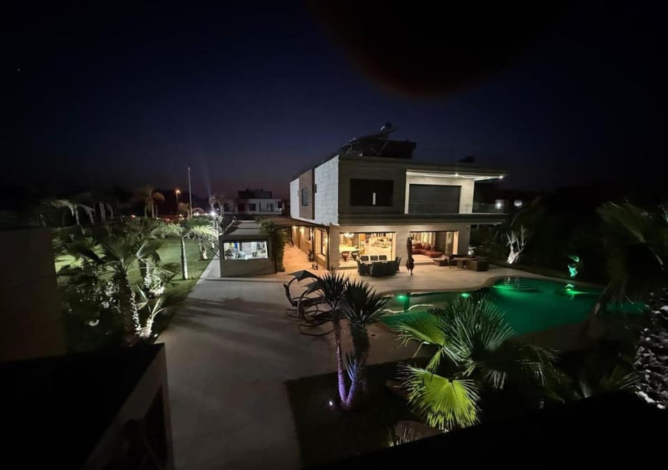 Property building, Patio, Night, Garden, Garden view, Pool view, Swimming pool