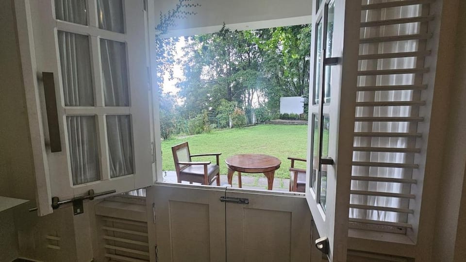 Hillside home with forest views near Wayanad Villa in Kerala