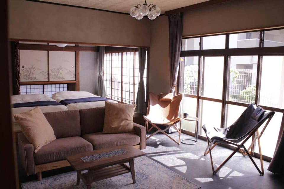 Bed, Living room, Seating area, Bedroom