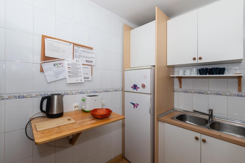 microwave, stove, toaster, washing machine, kitchen