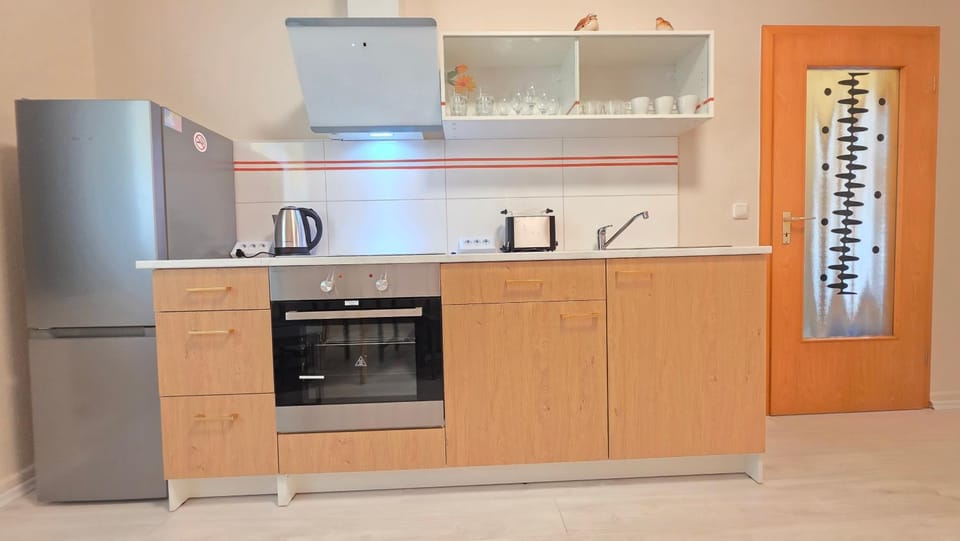 Kitchen or kitchenette, oven, stove