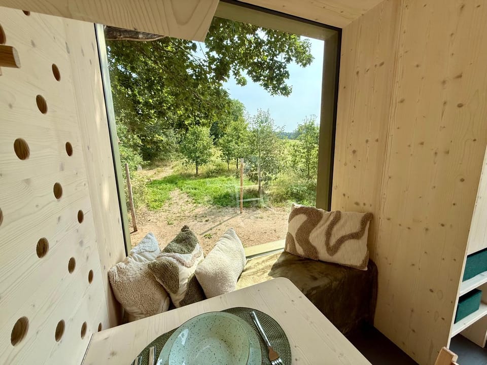 Natural landscape, View (from property/room), Living room, Seating area, Garden view