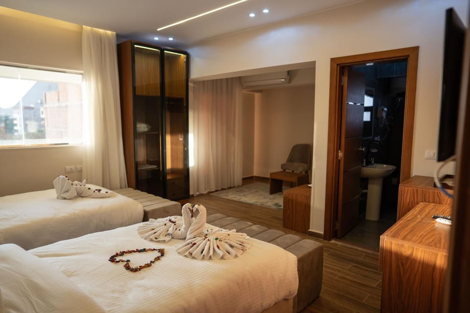 Bed, Living room, Photo of the whole room, Seating area, Bedroom, wardrobe