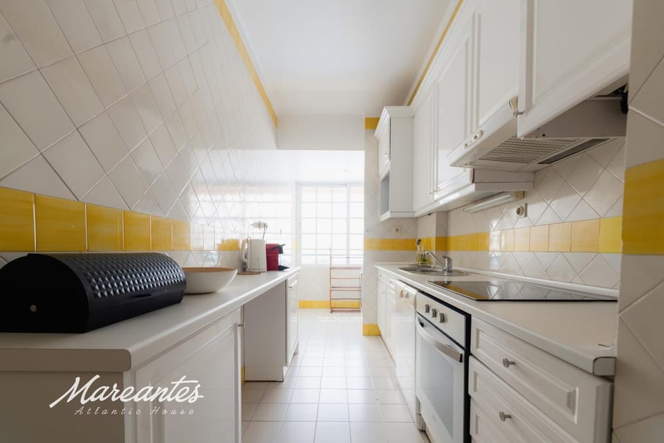 Kitchen or kitchenette, dishwasher, oven, stove