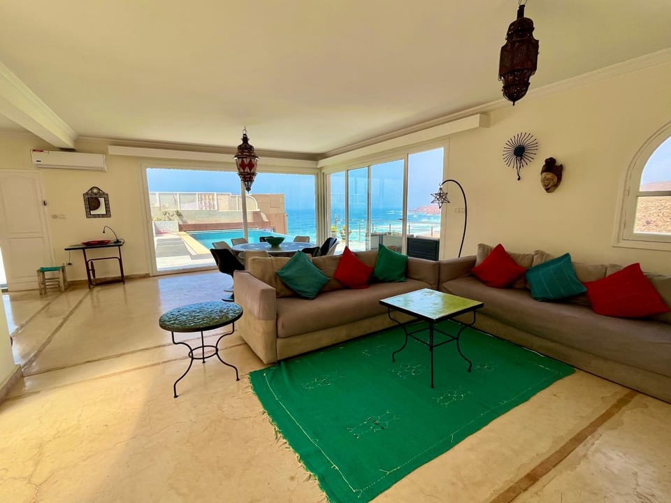Natural landscape, Living room, Seating area, Dining area, Sea view