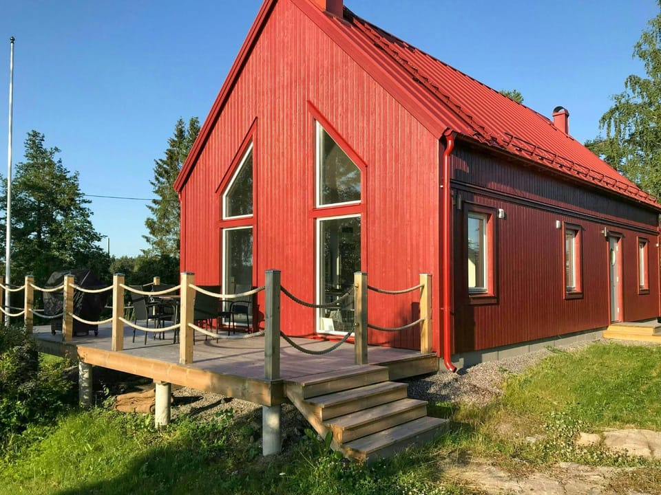 Newly built summer house by lake in Sala House in Sweden