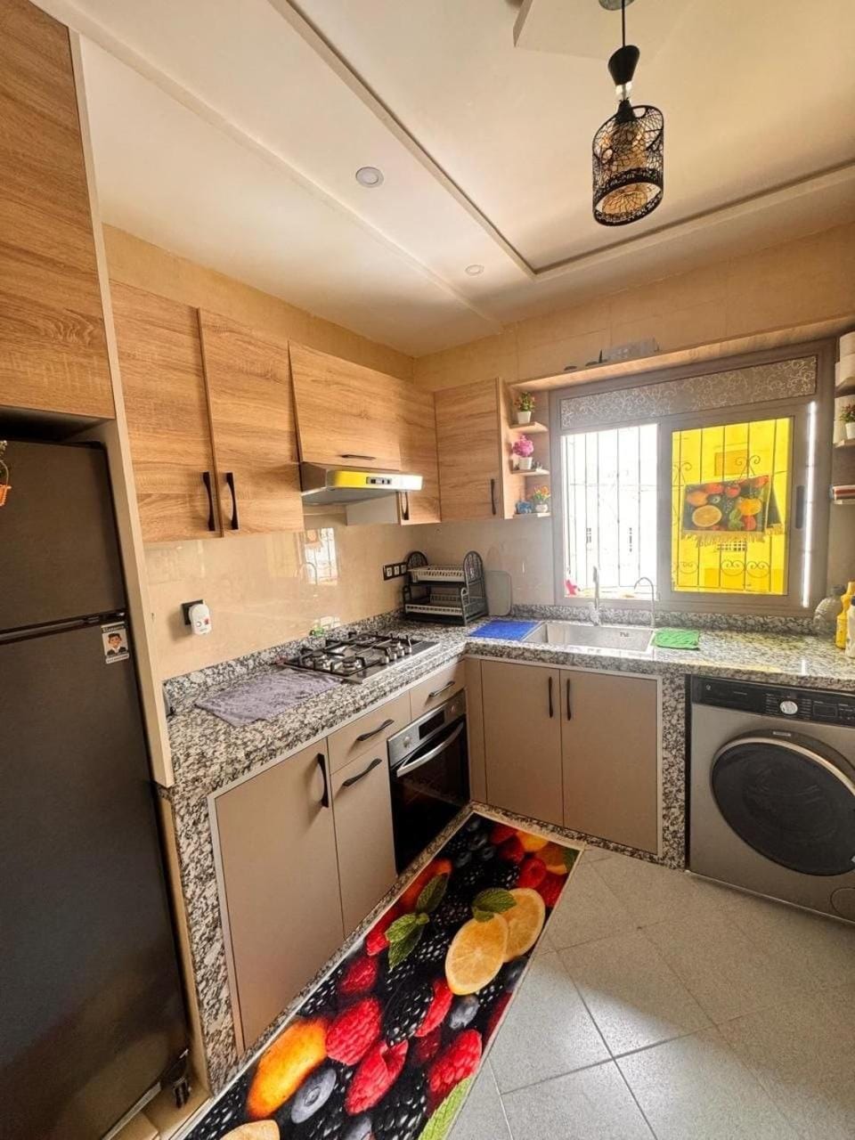Kitchen or kitchenette, washing machine