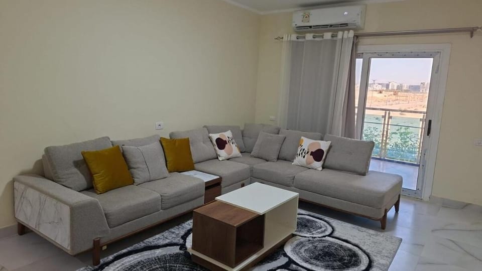 View (from property/room), Balcony/Terrace, Living room, Seating area, air conditioner