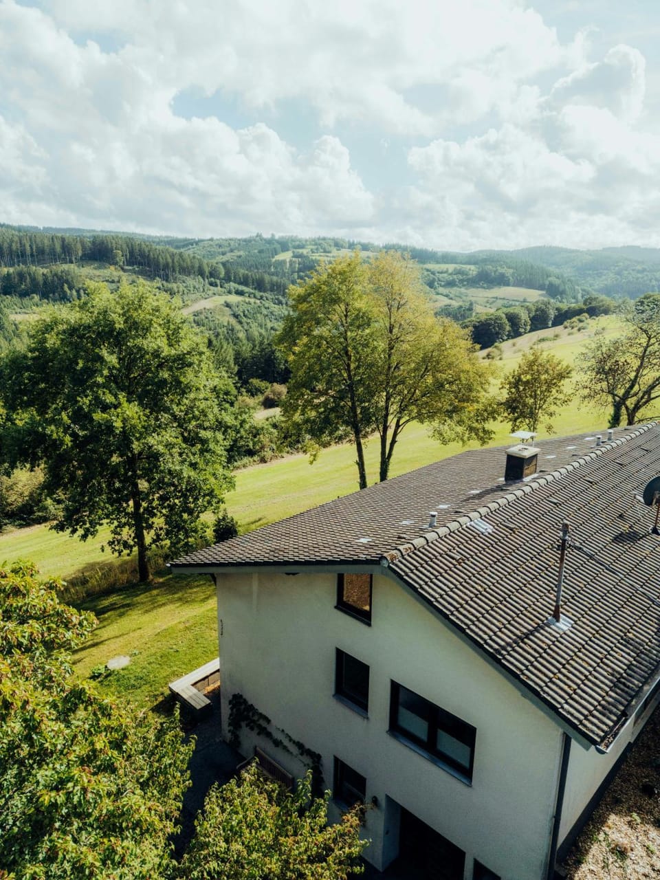 Mid-century house with valley view in Vulkaneifel House in Vulkaneifel