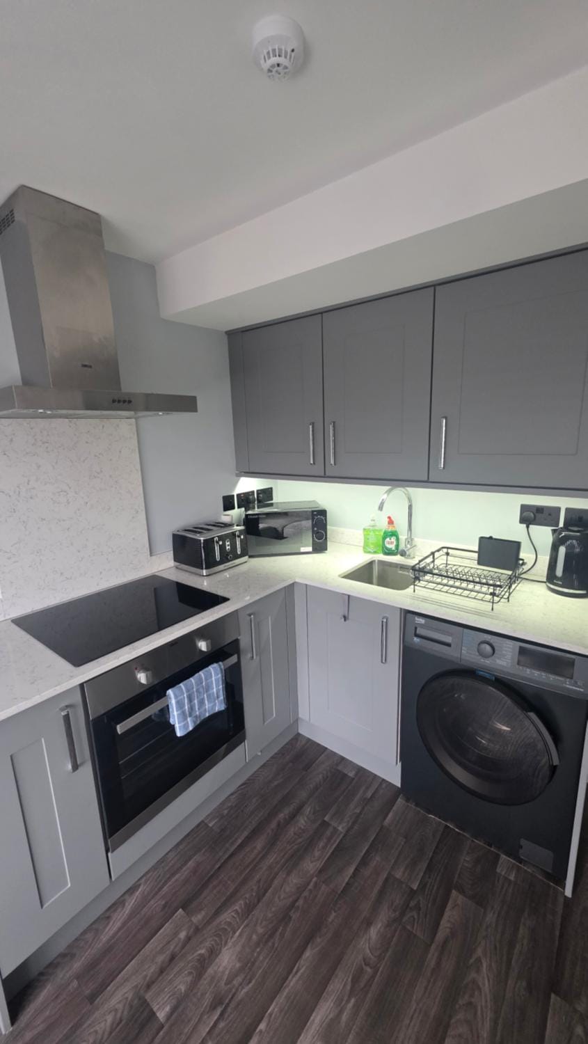 microwave, oven, stove, stove, toaster, washing machine, kitchen