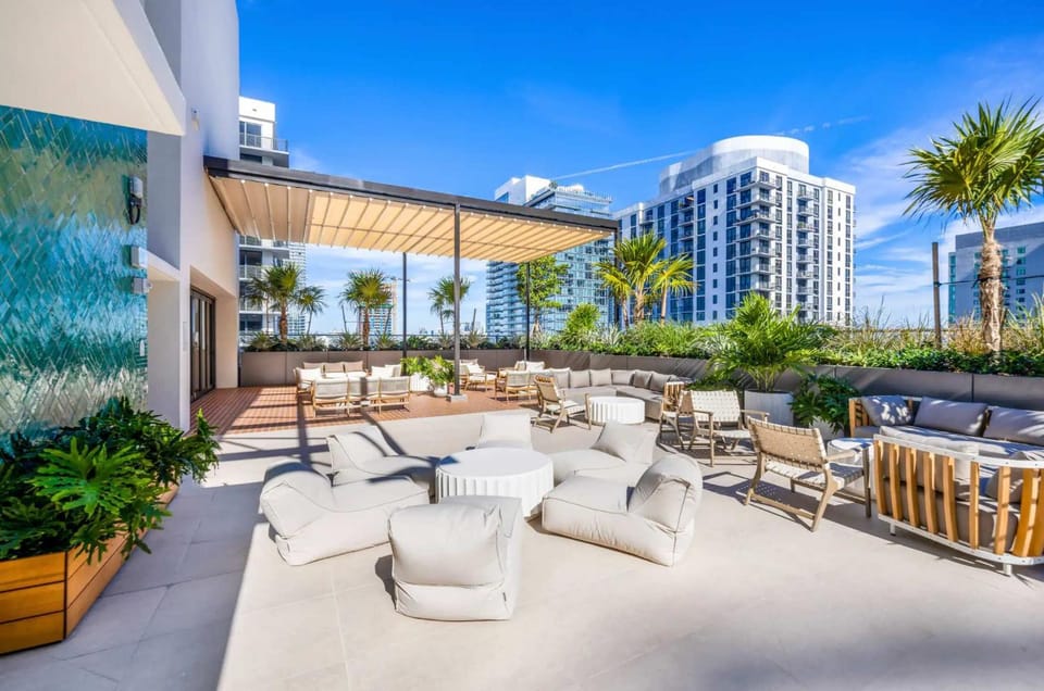 Property building, Day, Living room, Seating area, City view