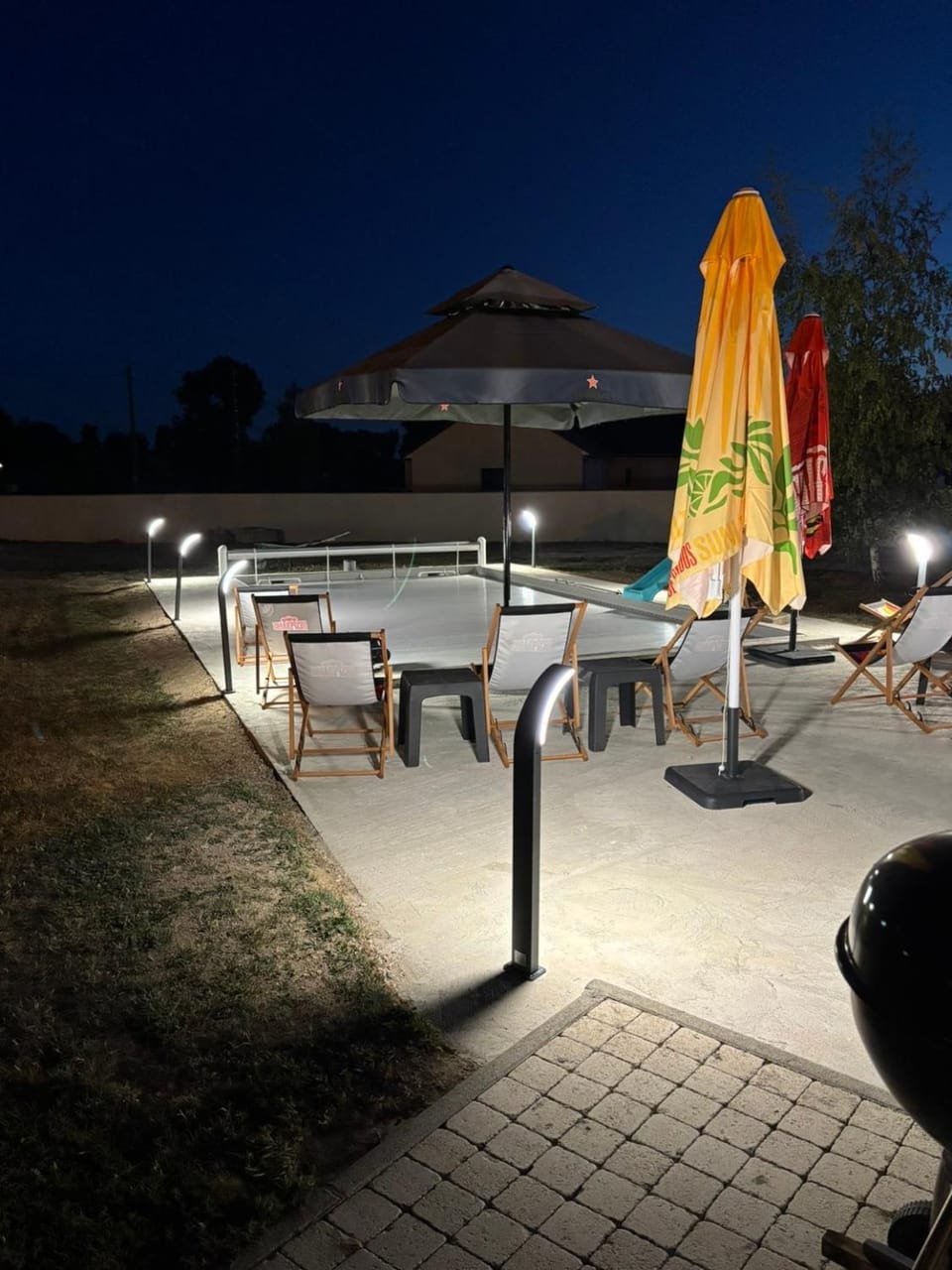 Patio, Night, Pool view, Swimming pool, sunbed