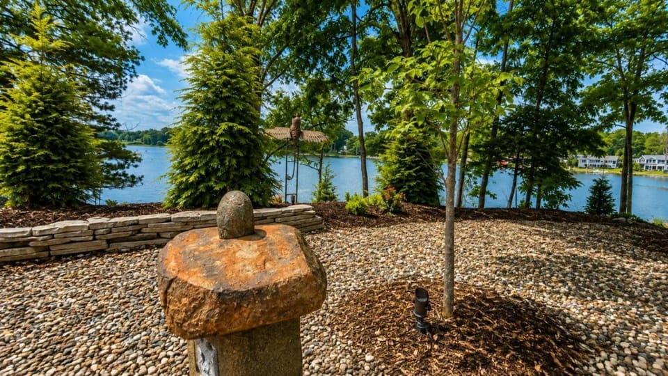 Private Island Retreat With Beach and Hot Tub House in Battle Creek