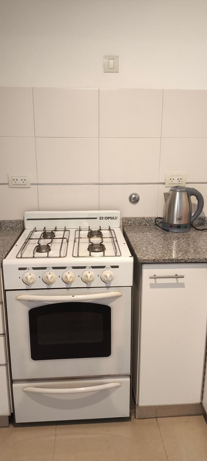 Kitchen or kitchenette, stove