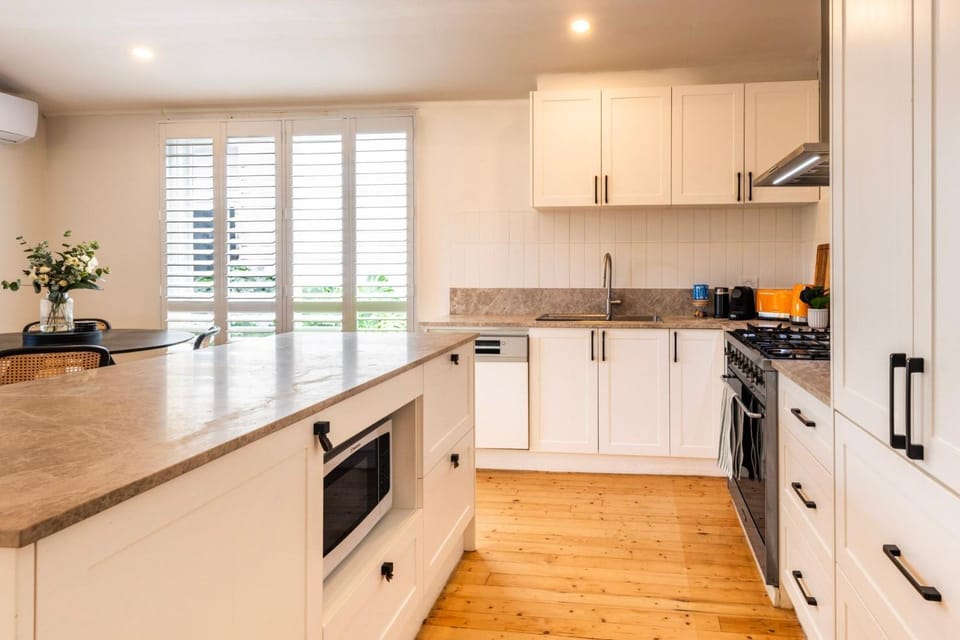 Kitchen or kitchenette, dishwasher, oven, stove, toaster