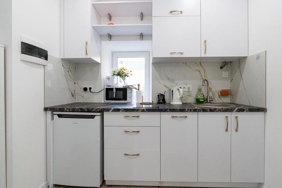 Kitchen or kitchenette, stove