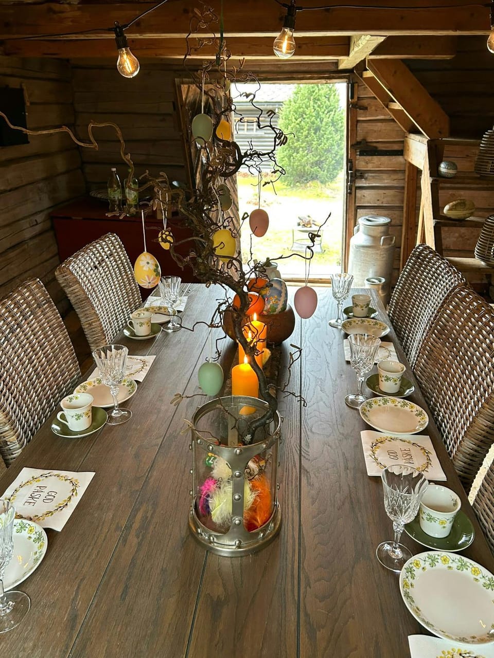 Cabin cluster with bonfire near Lake Eikeren Cabin in Viken, Norway