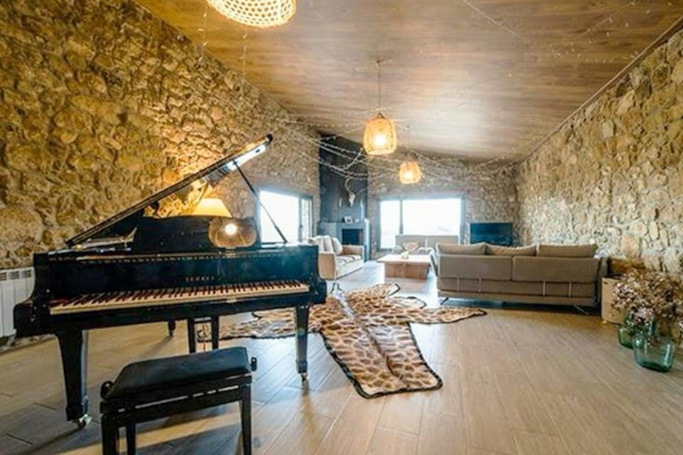 Designed 16th-century farmhouse among open fields House in Catalonia